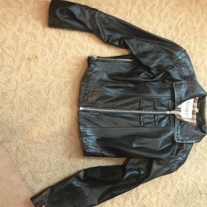 Woman’s black leather jacket.It’s in excellent condition
